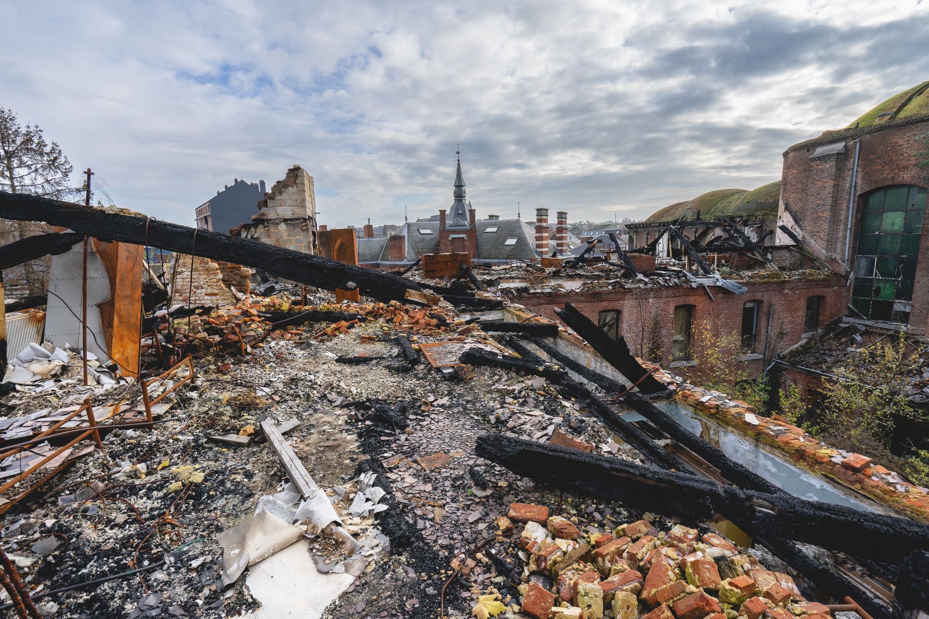 old abandoned building and the roof destroyed by fire somewhere in belgium